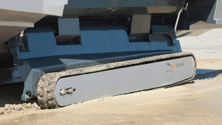 Illustration for article titled Retractable Tank Treads Make this Amphibious Boat Ready For Beach Assaults